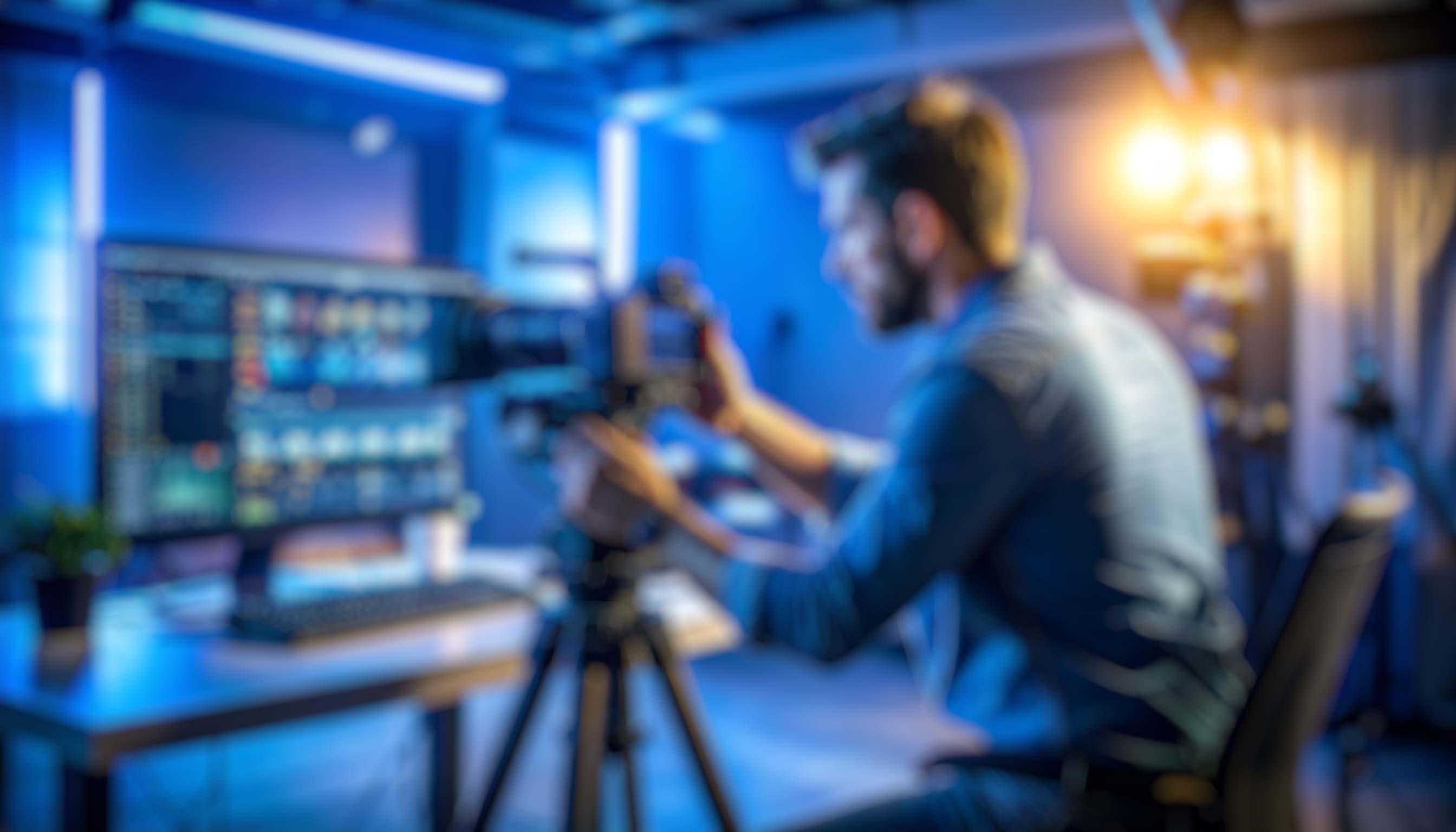 firefly a filmmaker adjusting a camera on a tripod in a professional studio environment, surr 220604